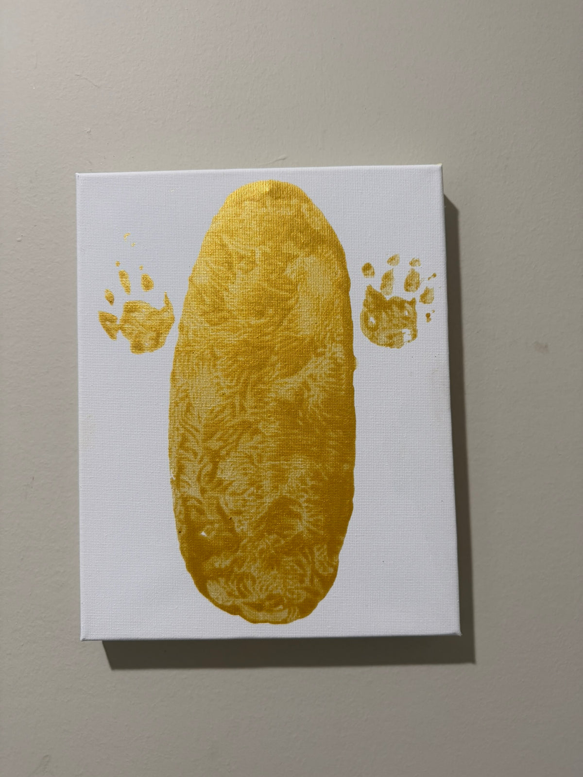 Buttercup 6-Month Tail and Paw Print on 8x10 white canvas